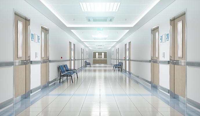 A clean and bright health care facility corridor