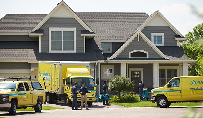 ServiceMaster team with vehicles