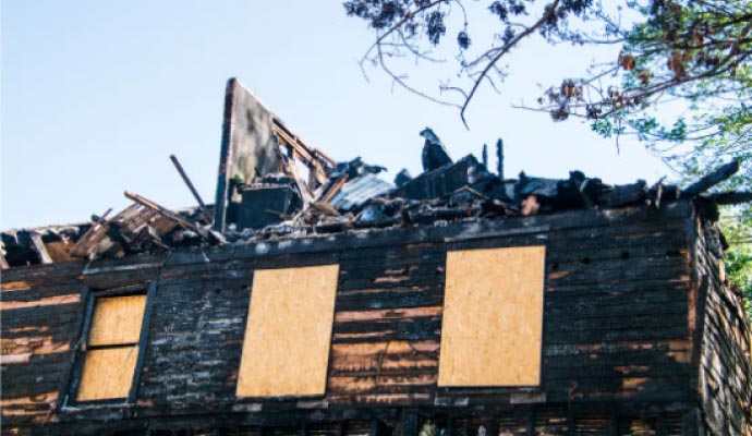 board up service on fire damaged house