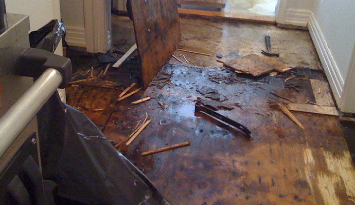 Wood Floor Damaged from Leak Restoration in Edison & East Brunswick